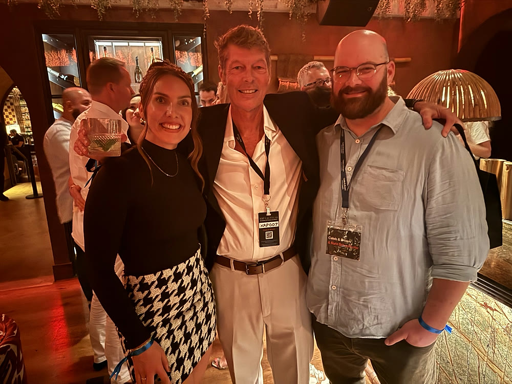 Kinley Coe with clients at XRP Las Vegas