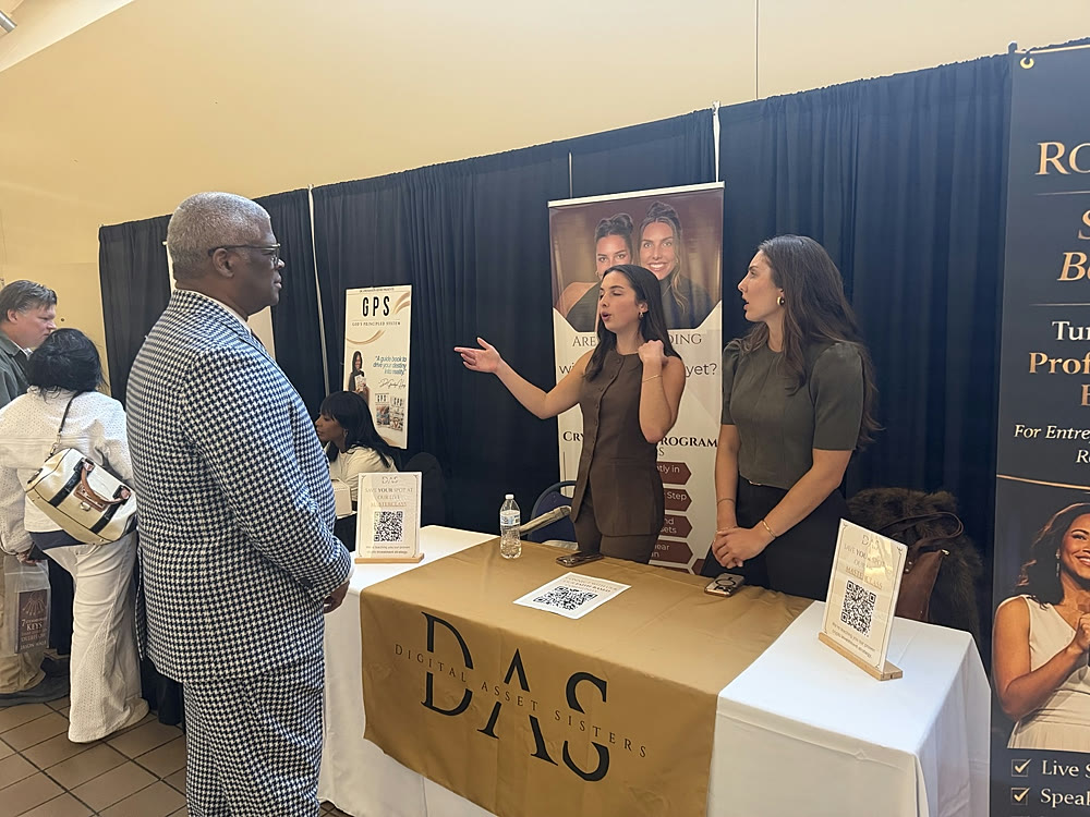 Kaelin and Kinley Coe at the Digital Asset Sisters booth